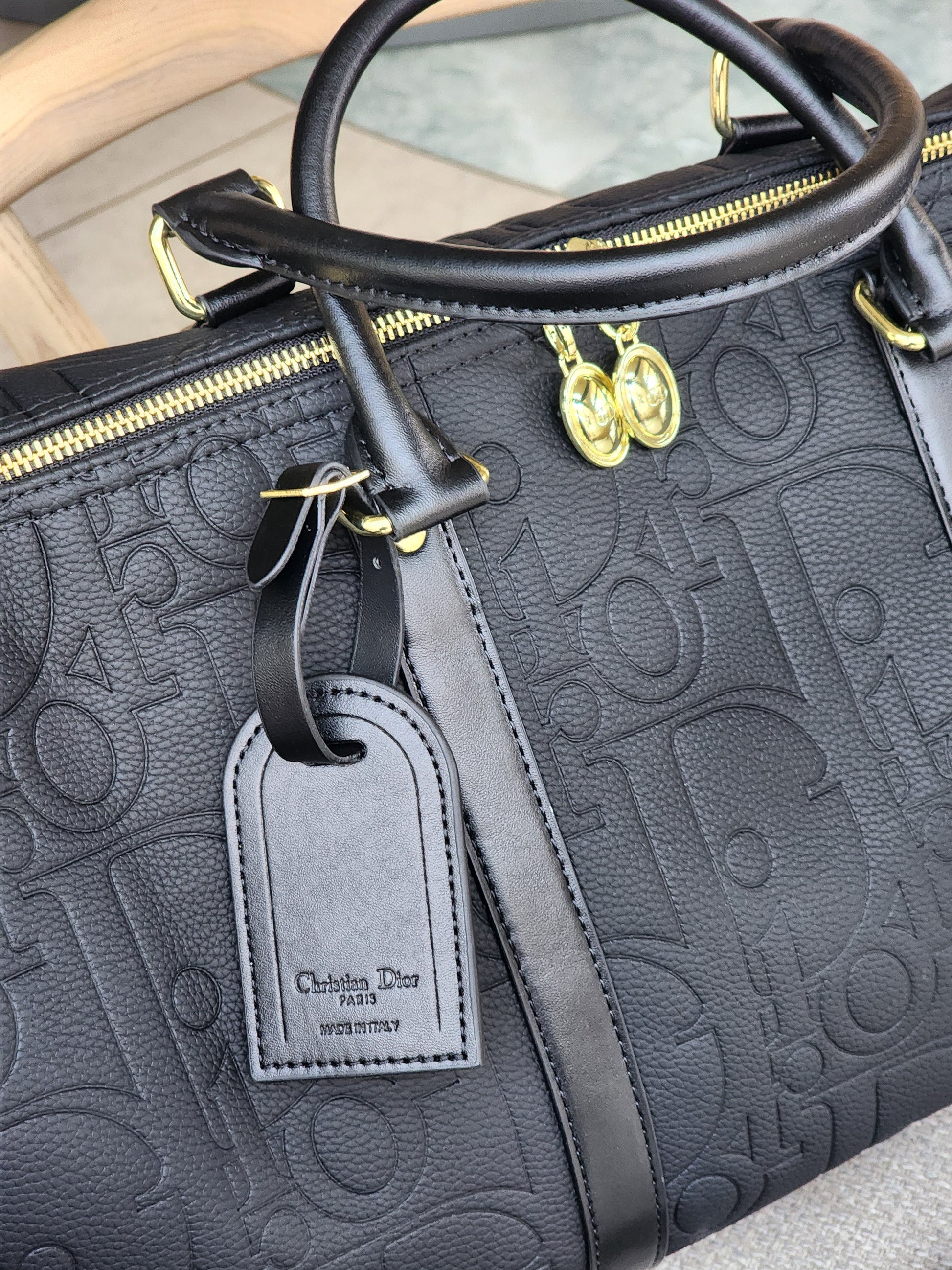 Noir Embossed Travel bag