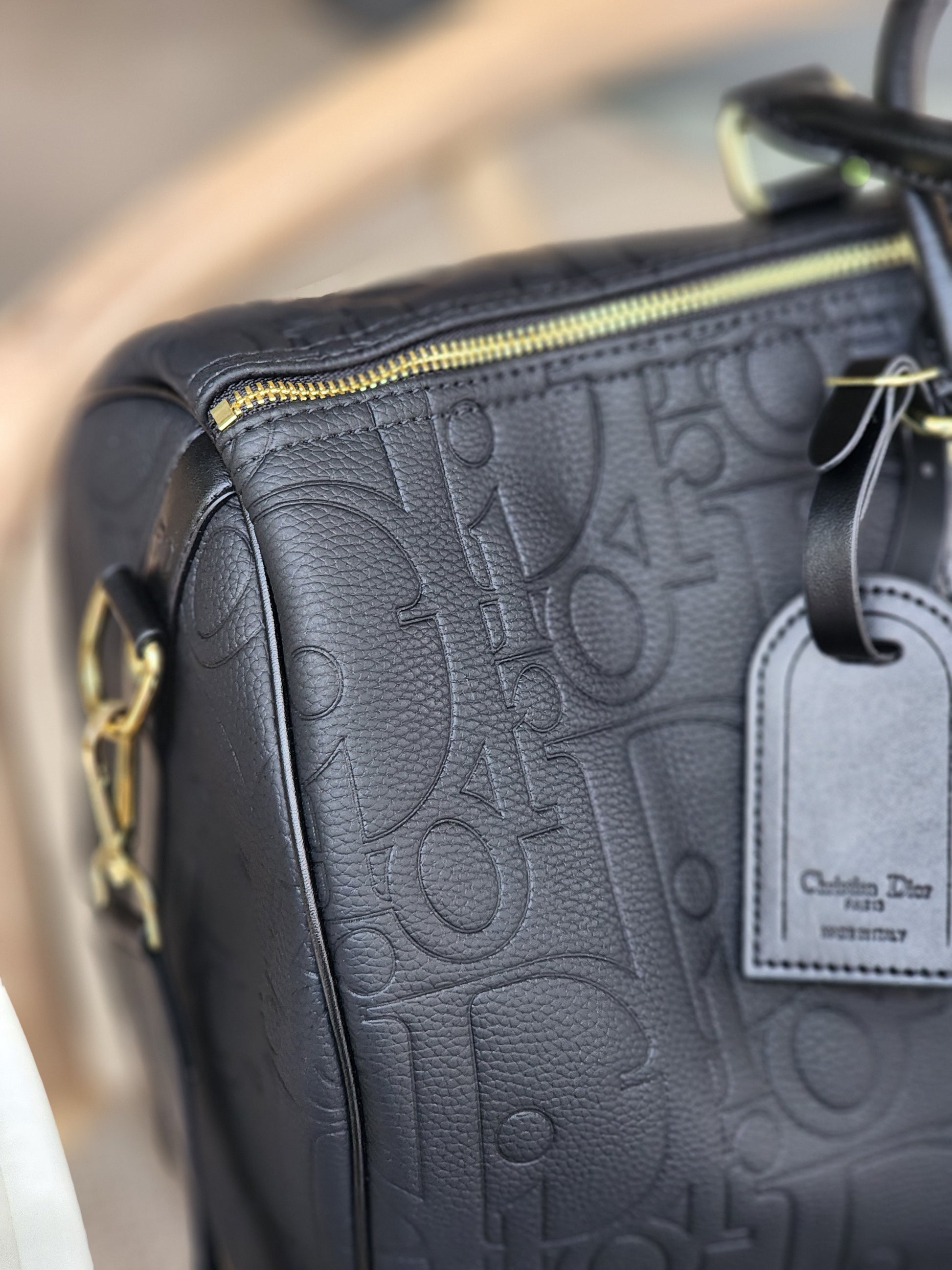 Noir Embossed Travel bag