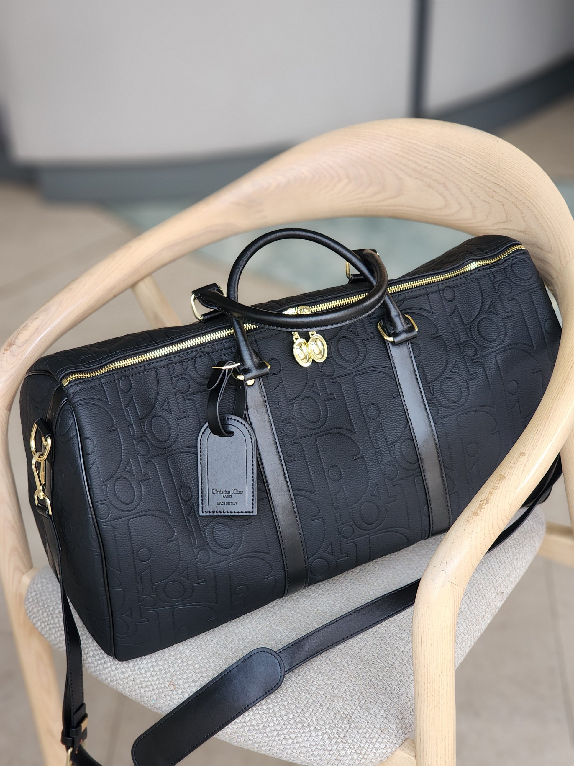 Noir Embossed Travel bag
