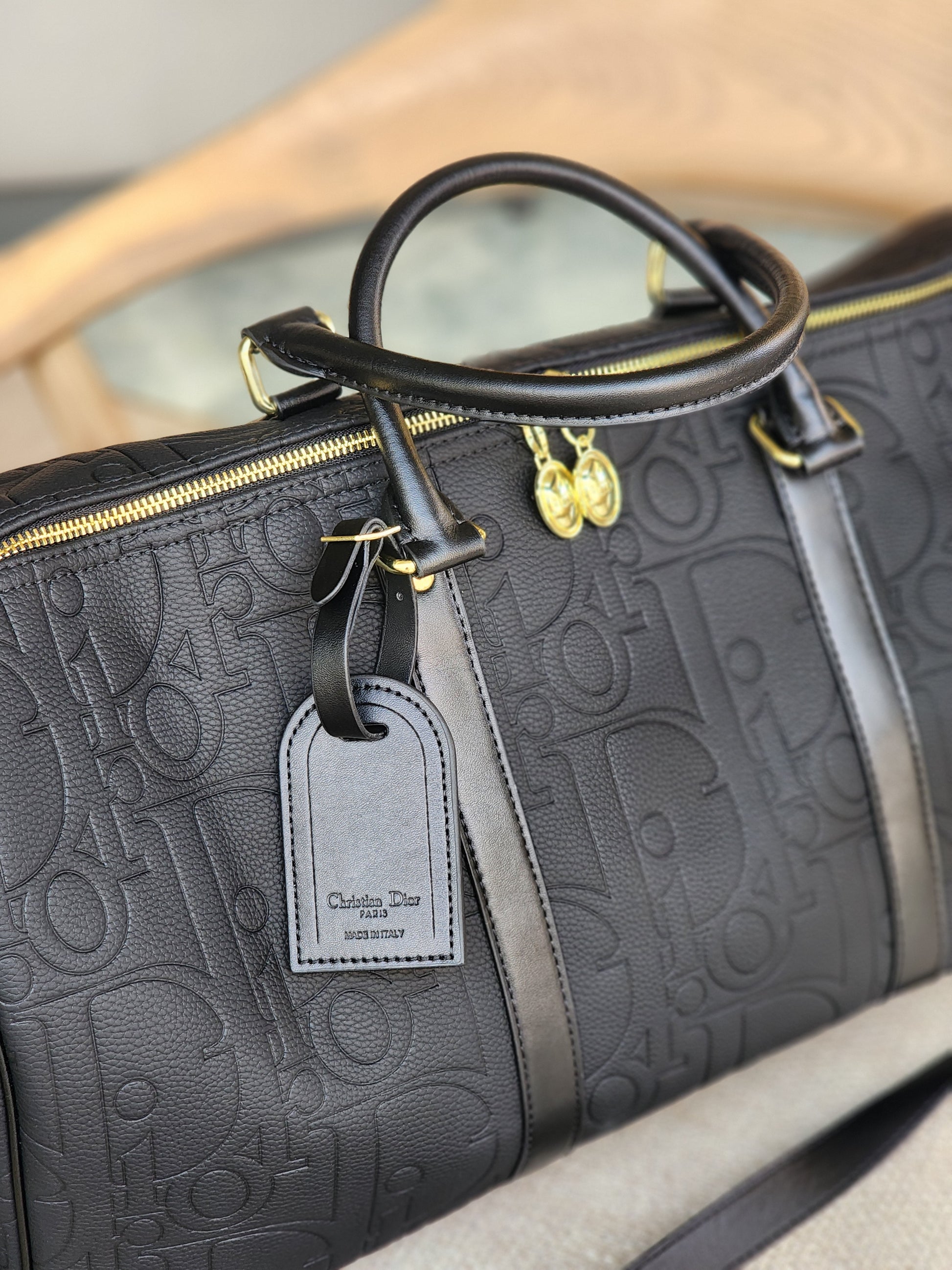 Noir Embossed Travel bag