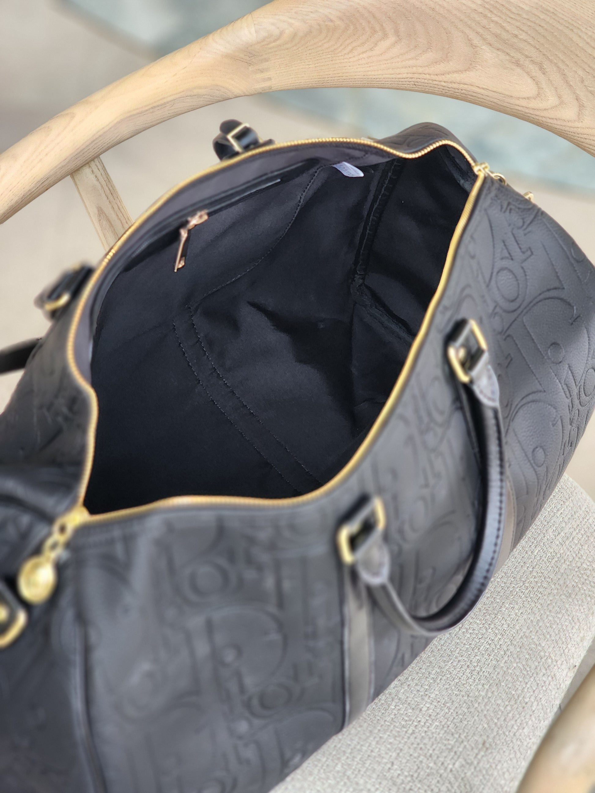 Noir Embossed Travel bag